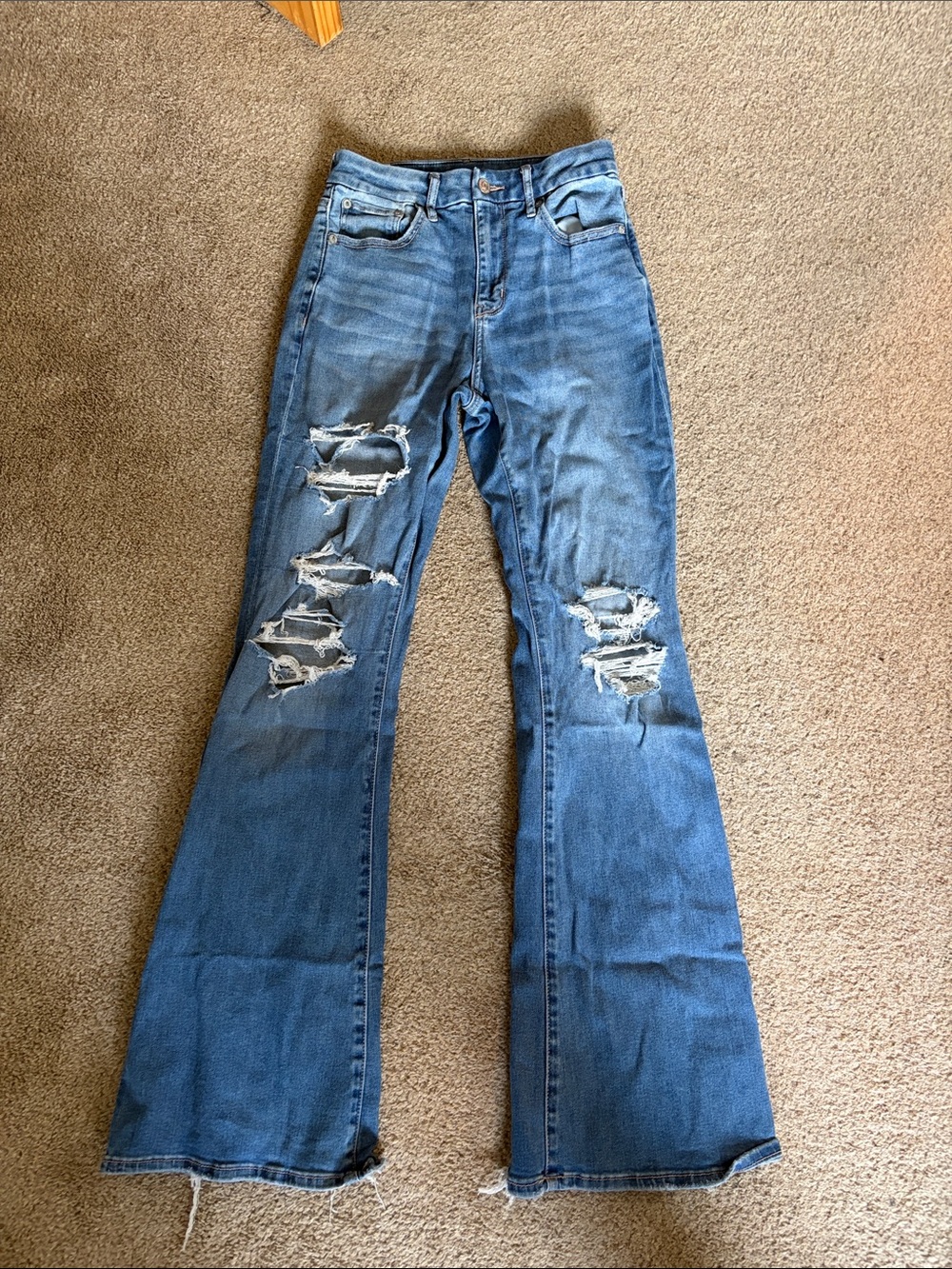 High-Rise Distressed Flared Jeans - American eagle